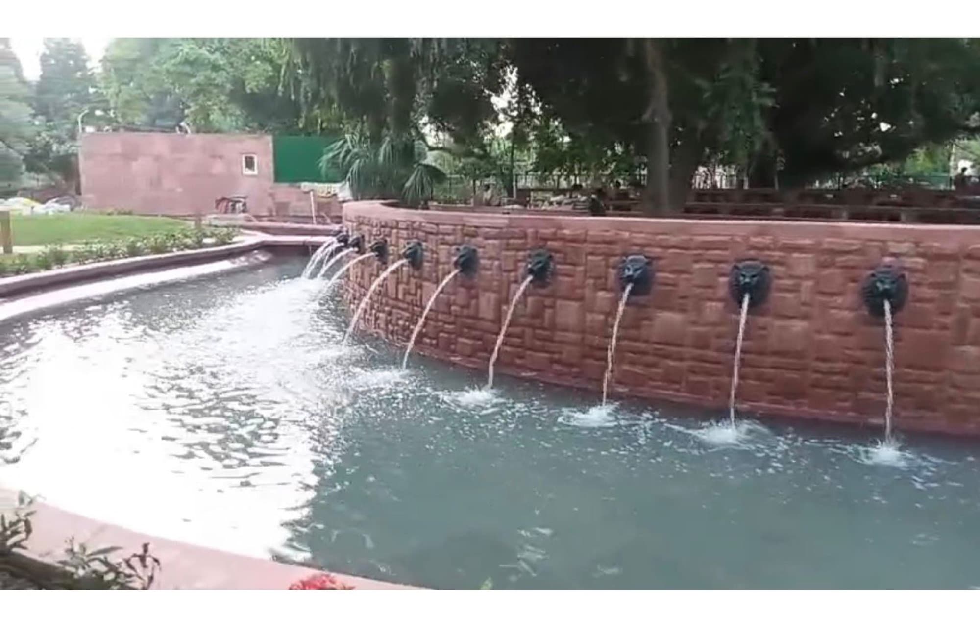 Red-sandstone water channel, President's Estate green belt