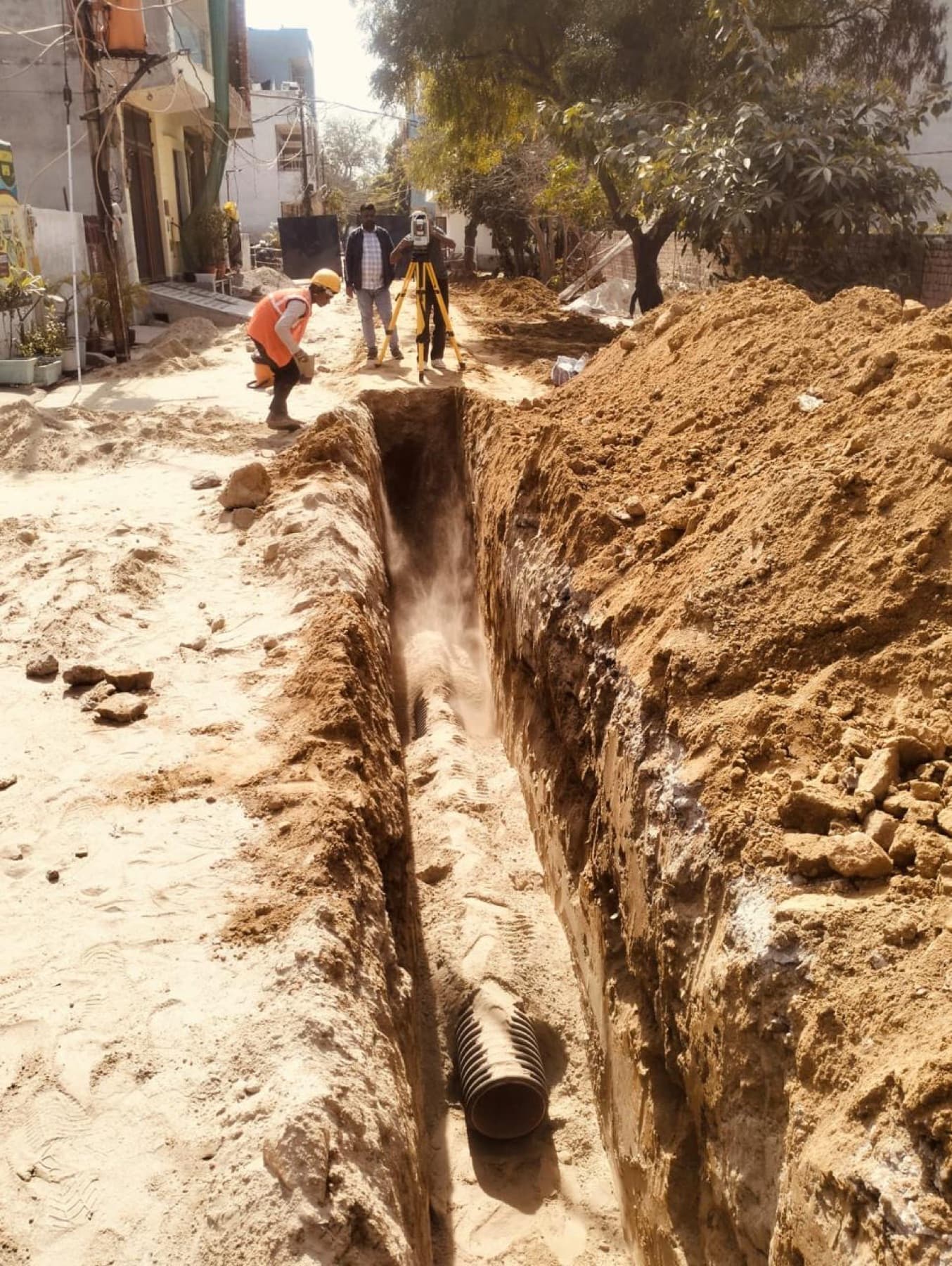 Trenching and survey on a live street