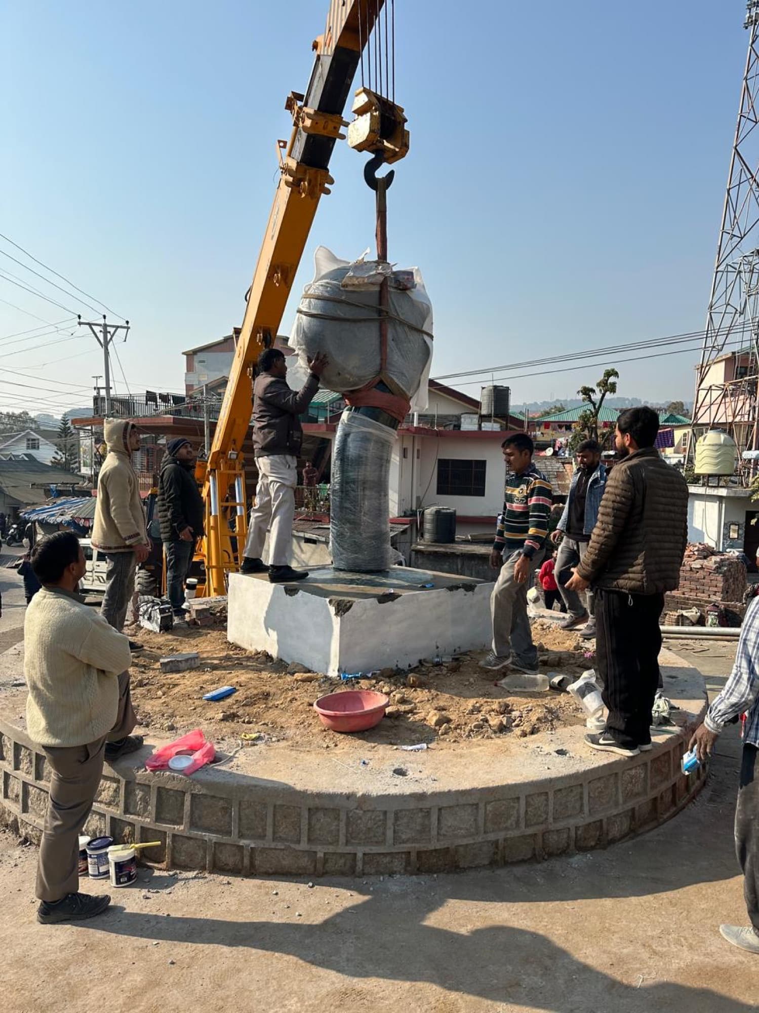 Setting a sculpture in place by crane