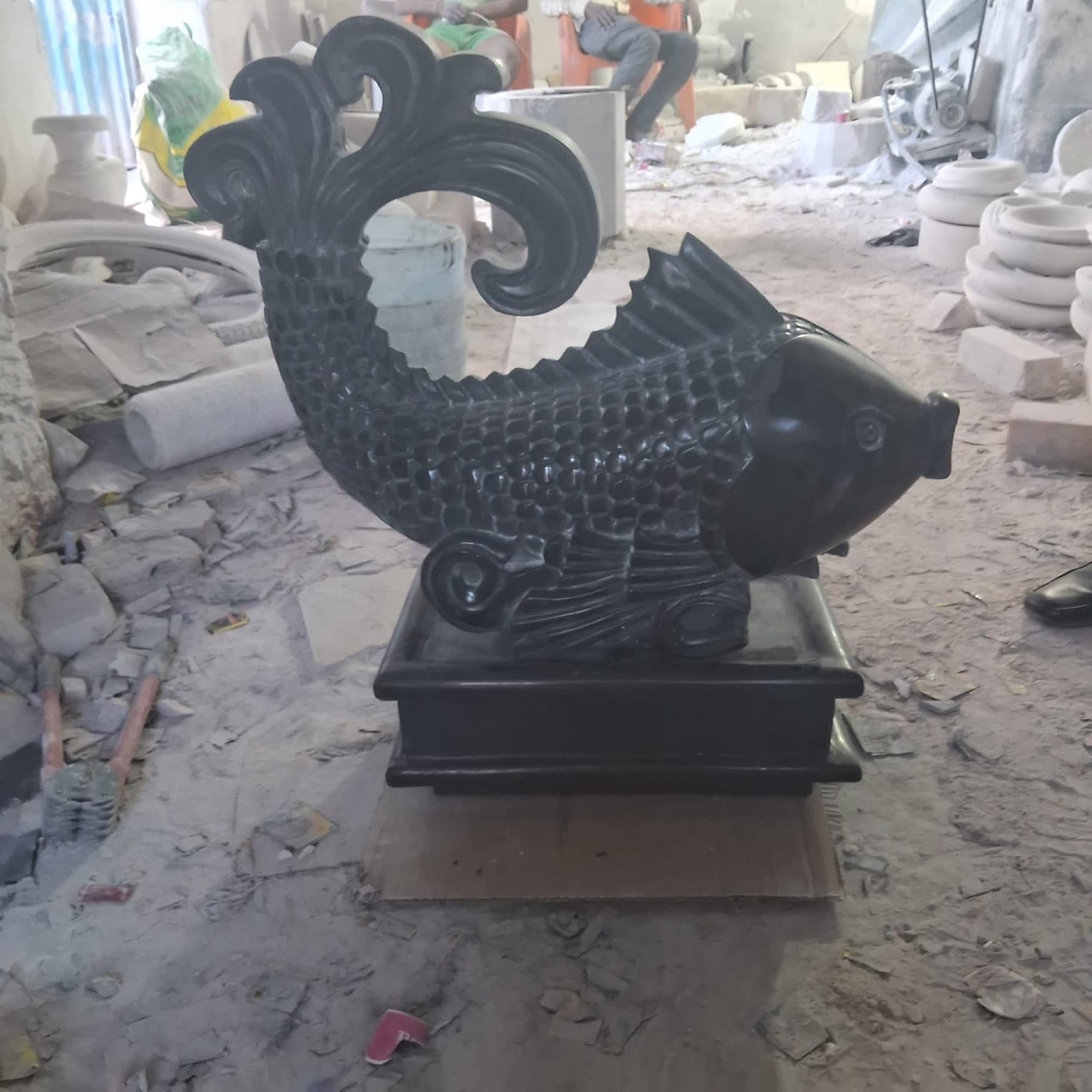 Sculpture detail — brass, granite & FRP