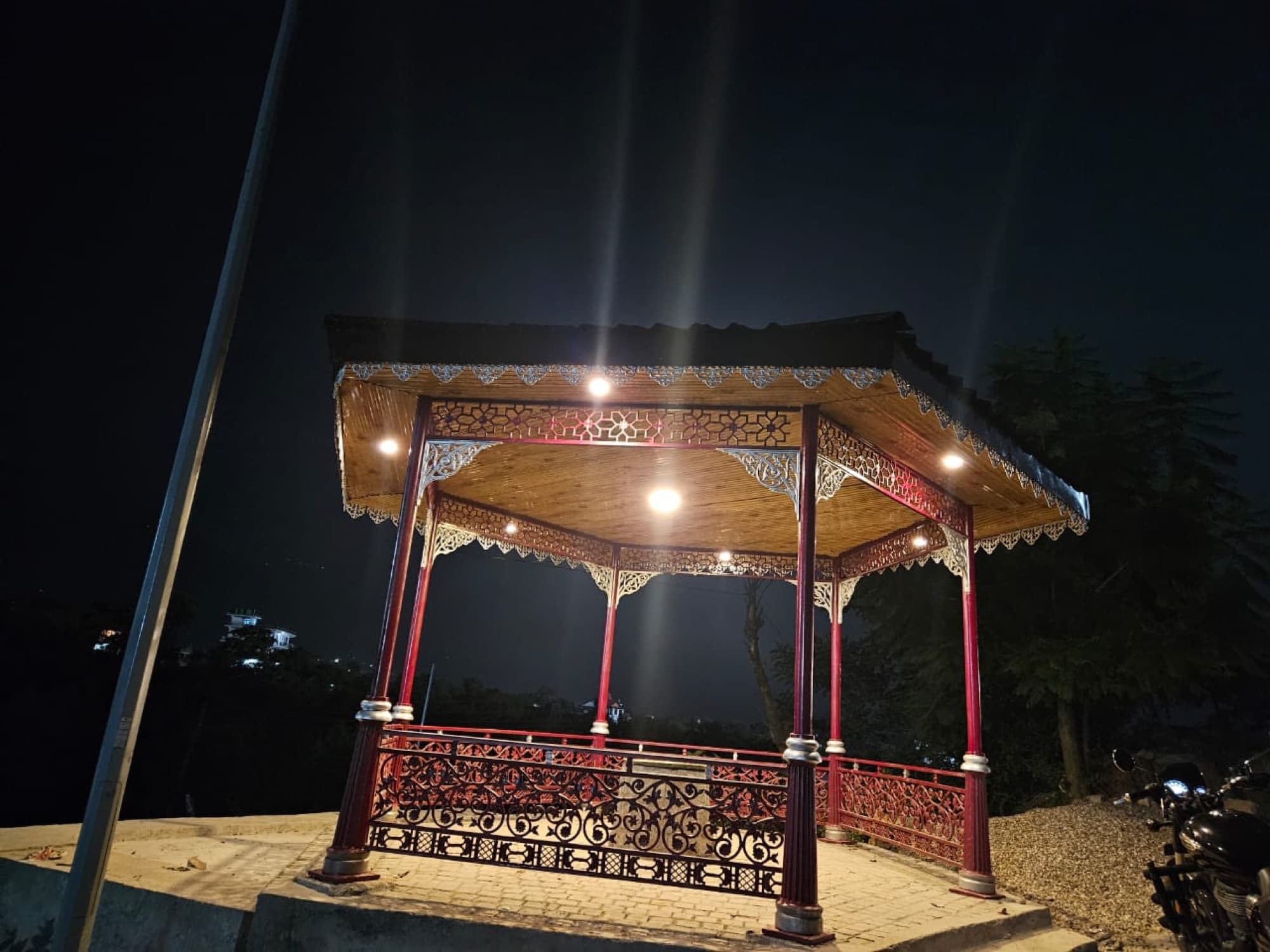 An illuminated cast-metal pavilion delivered by Rajnish Infratech